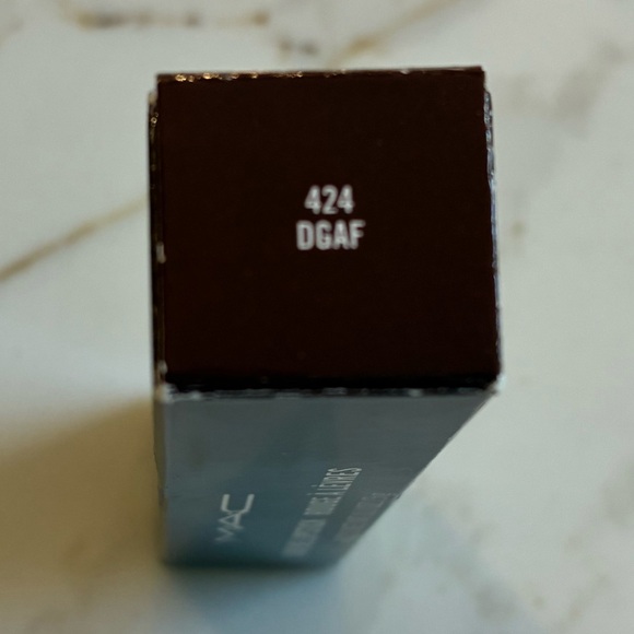 MAC lipstick in “DGAF”. Lovely shade of brown with some sheen to it. Brand new! - Picture 5 of 10